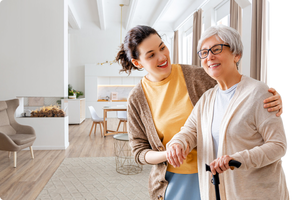 Caregiver helping elderly woman